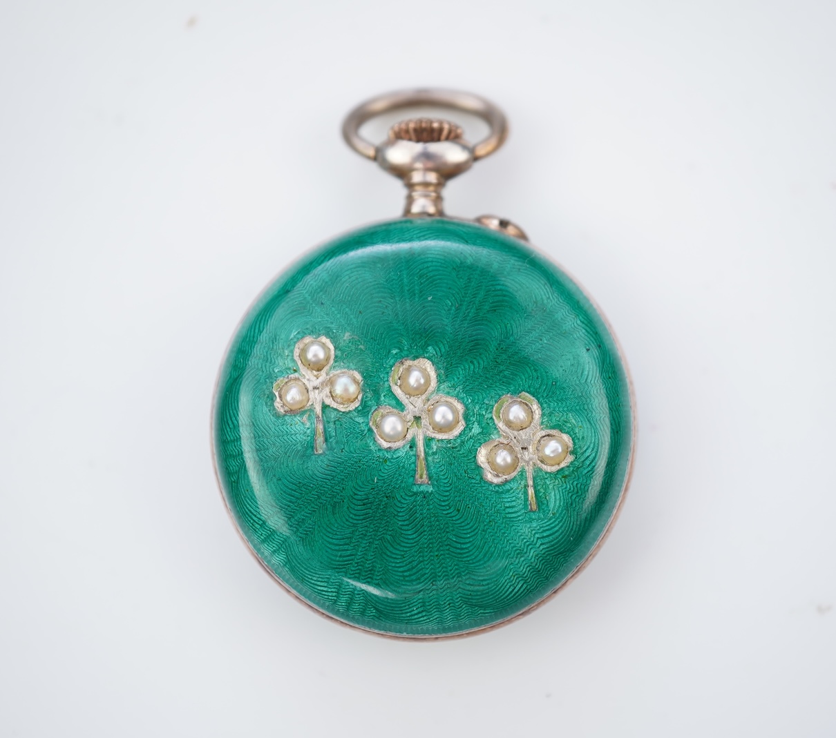 An enamel pocket watch and brooch, early 20th century